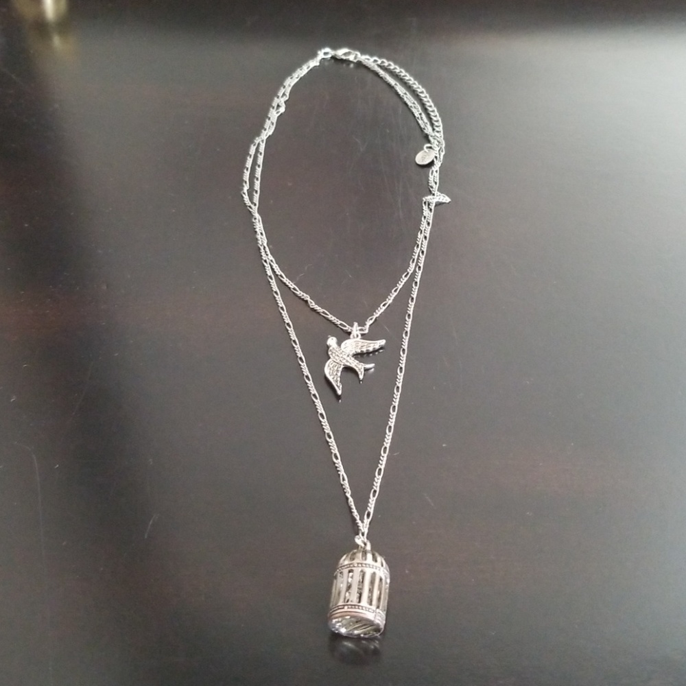Bird and cage necklace
